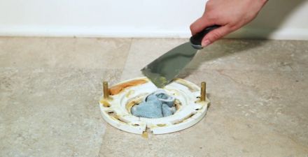 clean toilet flange